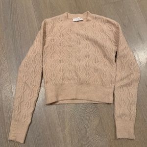 Tilly’s light pink cropped sweater